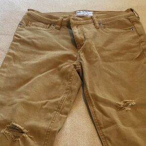 Free People size 27 cropped distressed mustard colored jeans